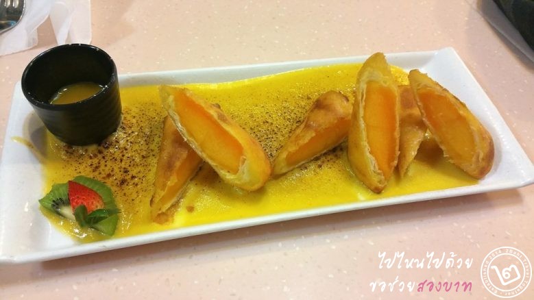 Deep fried mango spring roll with mango sabayon